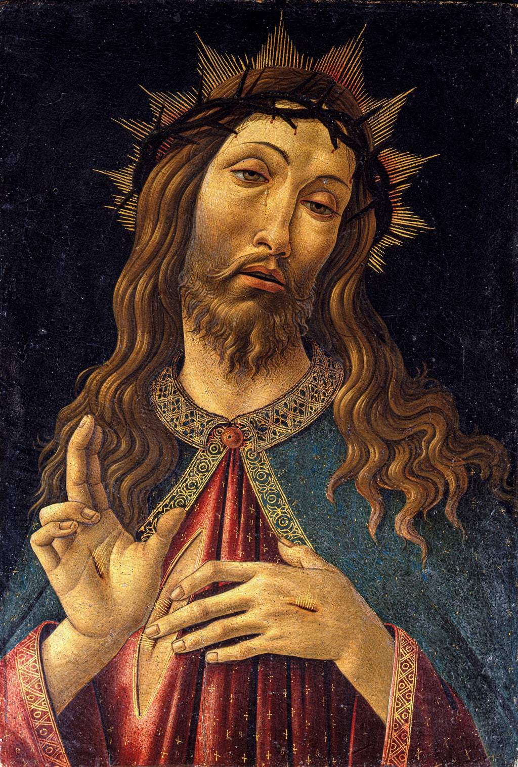 Quadro decorativo mostrando Jesus Cristo com coroa de espinhos, barba e cabelos longos, lágrimas nos olhos, com uma das mãos levantada em bênção e a outra sobre o peito, exibindo as chagas. Fundo escuro.
