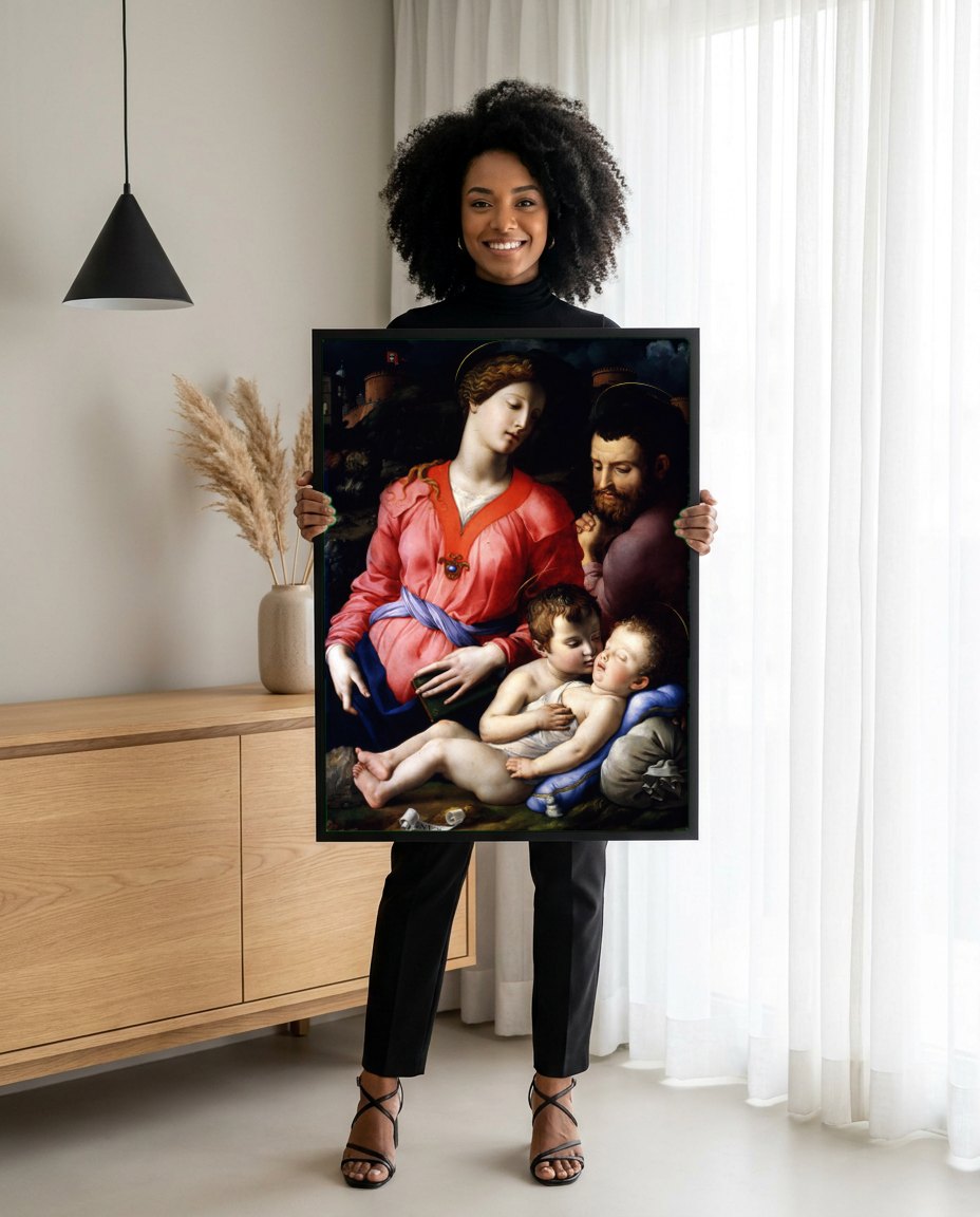 Quadro Decorativo Sagrada Família com São João Batista - Bronzino | modelo apresentando o quadro emoldurado
