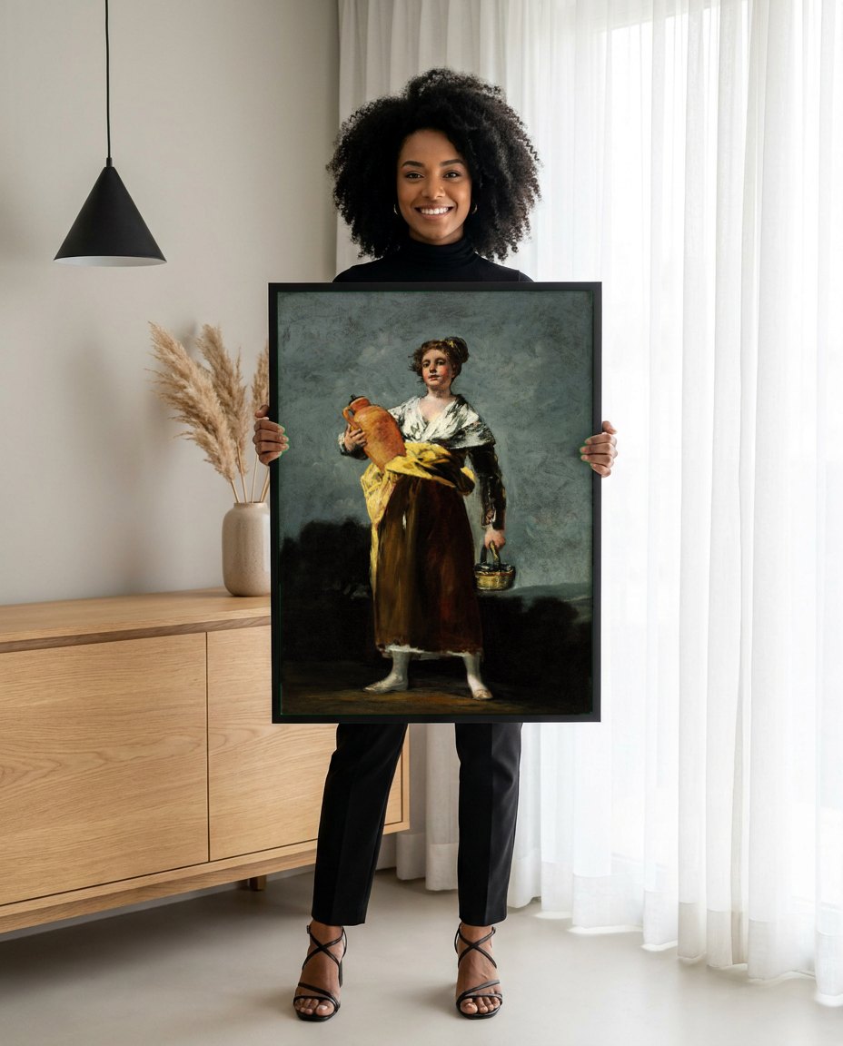 Quadro Decorativo A Aguadora - Goya | modelo apresentando o quadro emoldurado