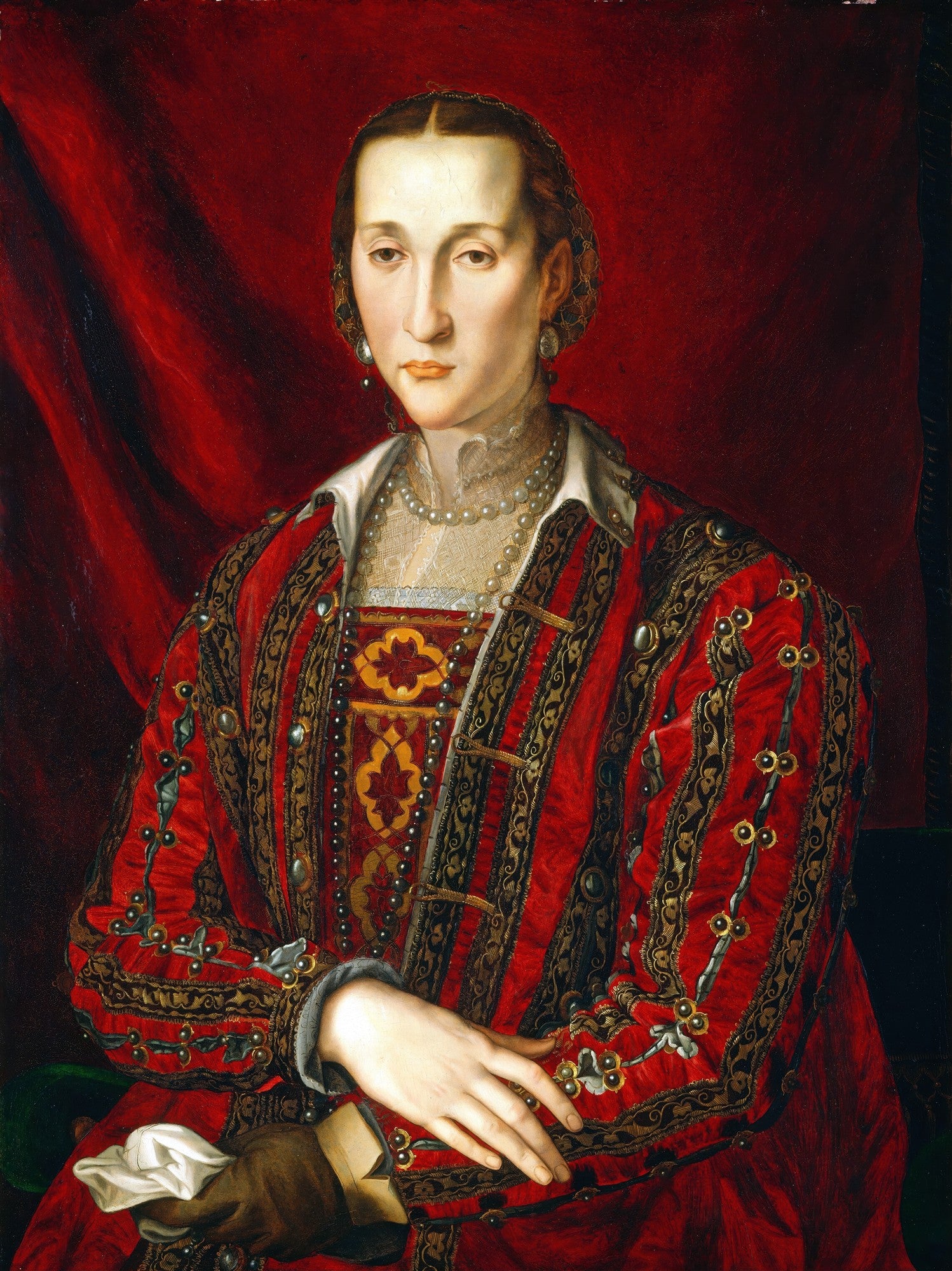 Retrato de uma dama renascentista vestida ricamente em vermelho e ouro, com pérolas e um semblante sério, pintado por Agnolo Bronzino.