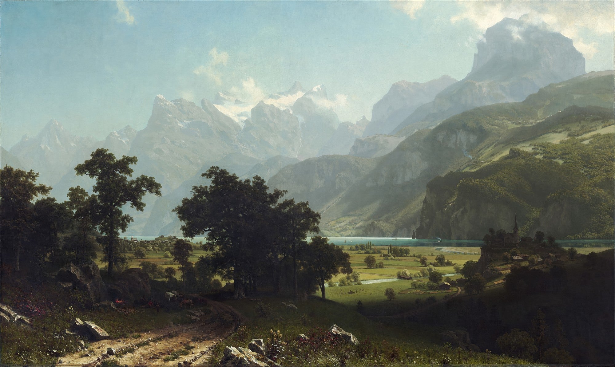 Pintura a óleo de Albert Bierstadt, 'Lake Lucerne', mostrando um vasto vale alpino com um lago azul-esverdeado, montanhas imponentes e picos nevados ao fundo, e árvores e um caminho em primeiro plano. Céu claro e azul com algumas nuvens.