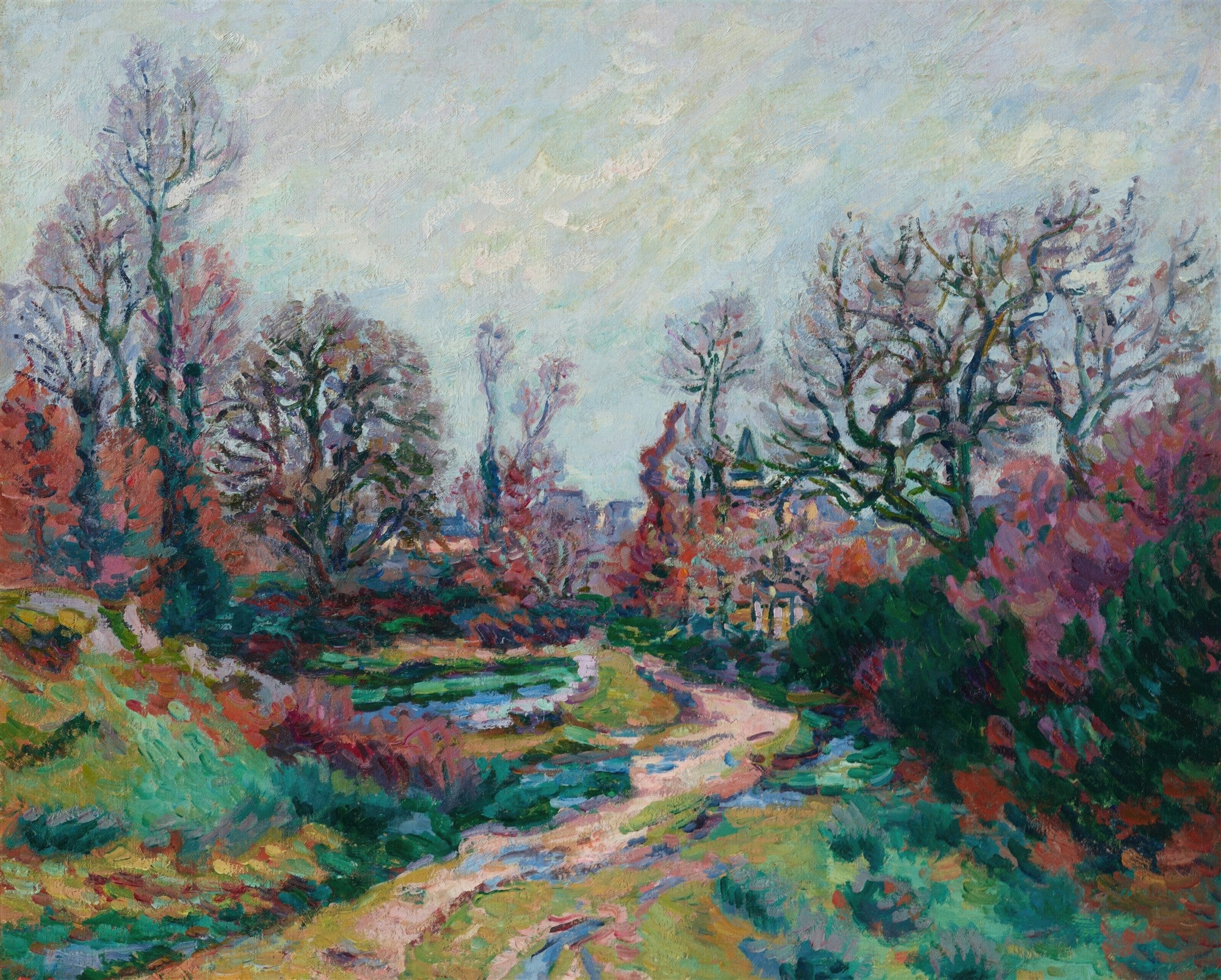 Pintura a óleo de Armand Guillaumin, 'Paisagem Outonal', com árvores coloridas em tons de vermelho, laranja e verde, um caminho de terra sinuoso e um céu nublado, em estilo impressionista.
