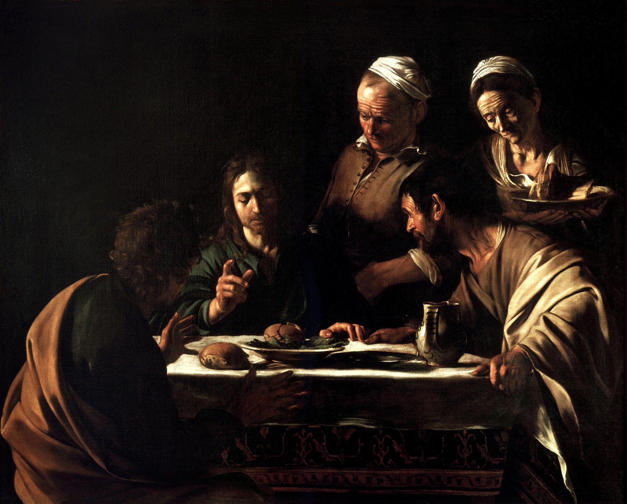 Quadro decorativo detalhando a pintura 'A Ceia em Emaús' de Caravaggio, com Cristo e dois discípulos à mesa, e um estalajadeiro e uma mulher ao fundo, tudo iluminado por um forte contraste de luz e sombra.