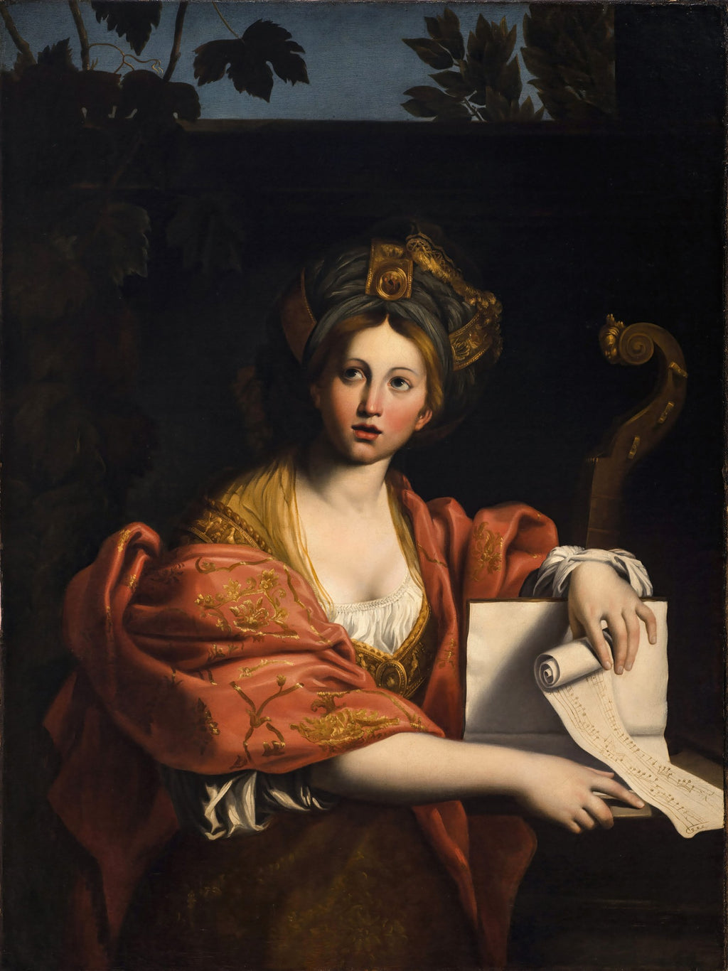 Pintura a óleo barroca de Domenichino, 'A Sibila de Cumas', retratando uma mulher jovem com turbante, vestes vermelhas e douradas, segurando um rolo de partituras, com expressão contemplativa e fundo escuro.
