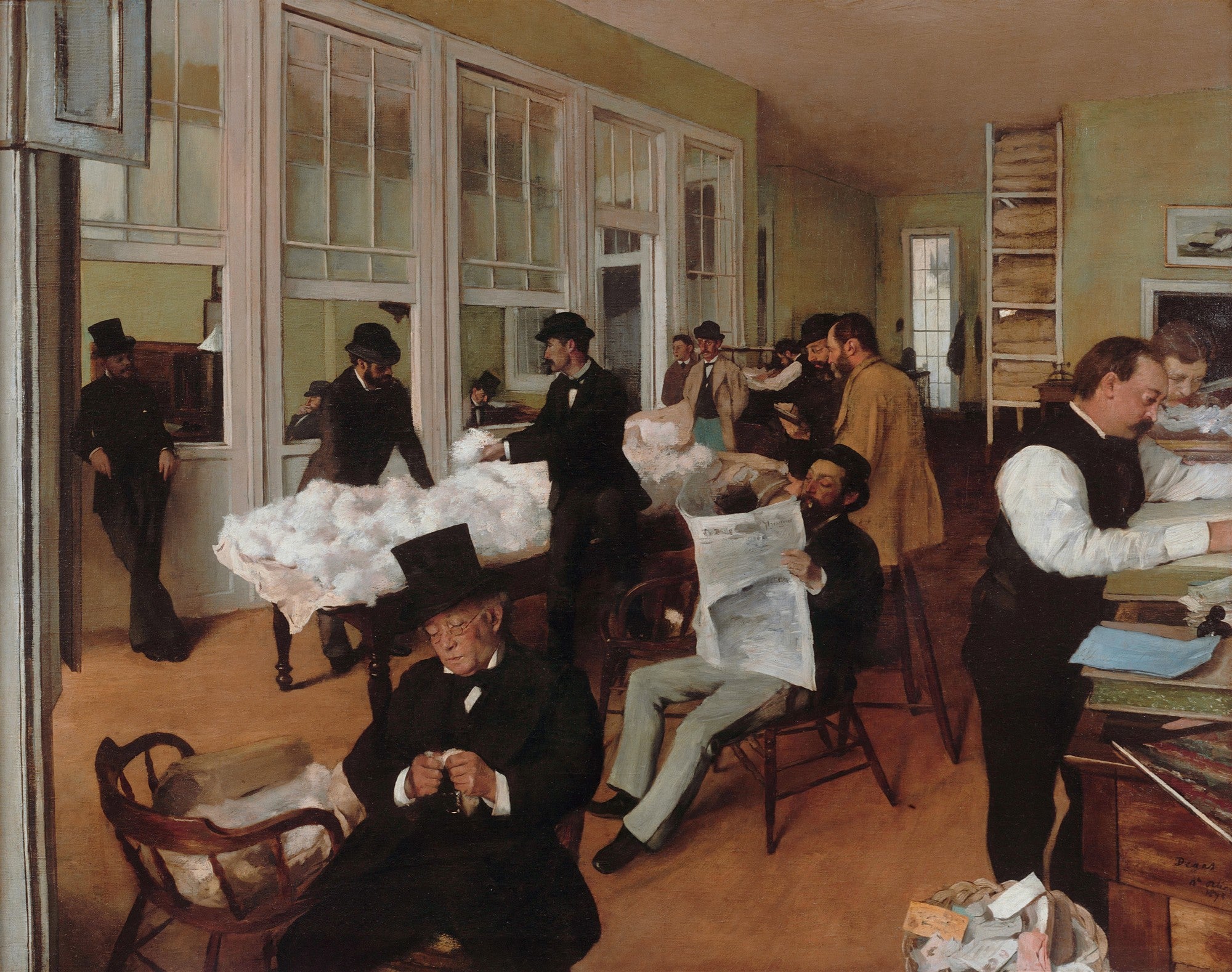 Quadro decorativo mostrando a obra 'O Escritório de Algodão em Nova Orleans' de Edgar Degas, com homens trabalhando em um escritório, cercados por fardos de algodão e luz natural, em tons terrosos e neutros.