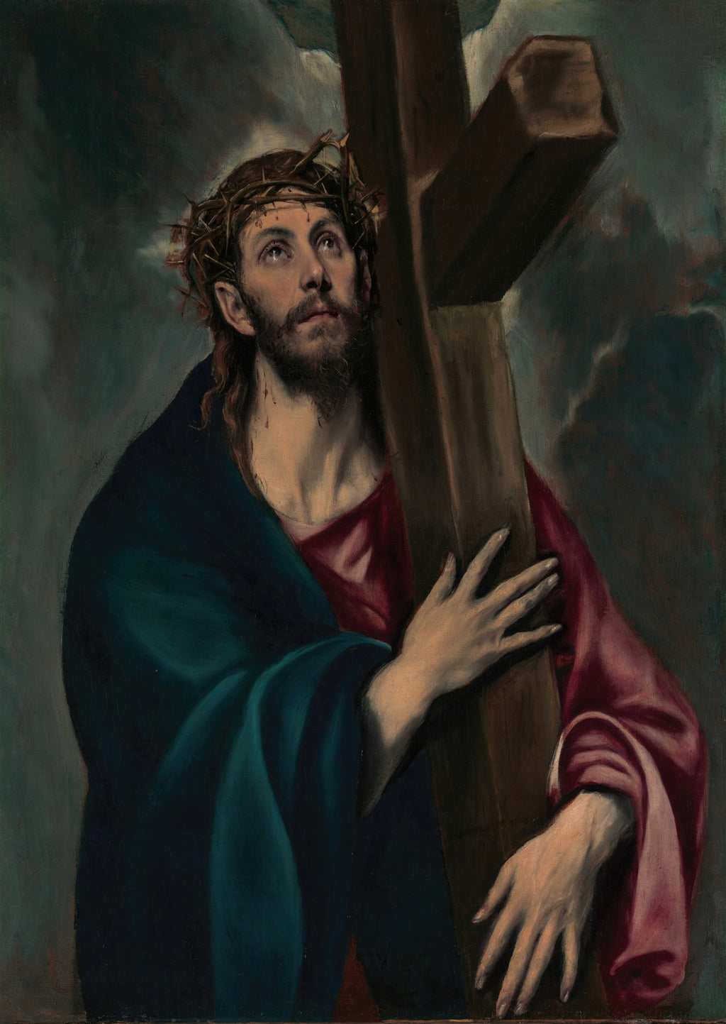 Quadro decorativo mostrando Cristo carregando uma cruz de madeira, com coroa de espinhos e olhos voltados para o céu, em tons escuros e dramáticos, obra de El Greco.