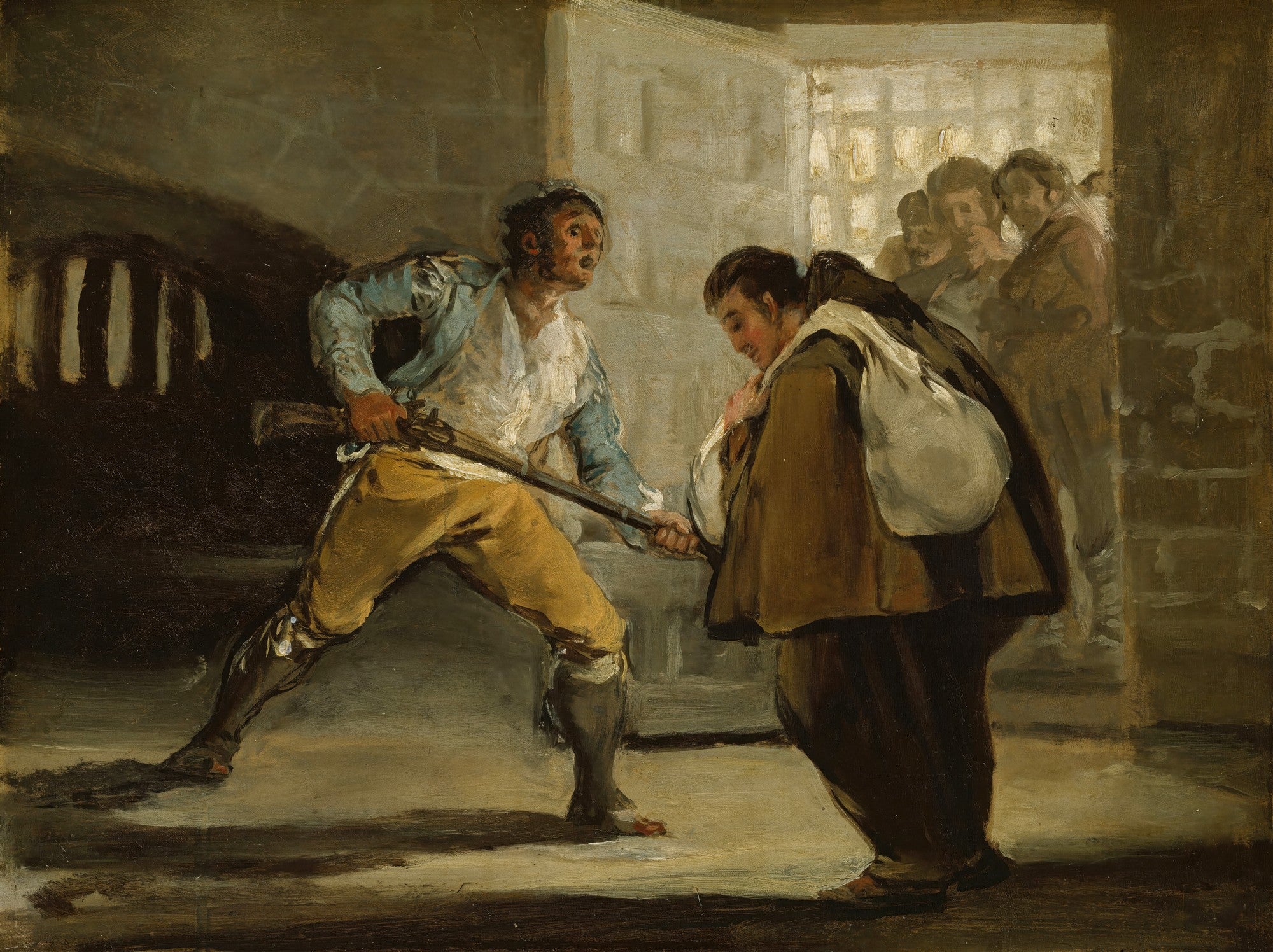 Quadro a óleo de Francisco de Goya, intitulado A Prisão, mostrando uma cena sombria e dramática com figuras em uma cela ou ambiente prisional, com um guarda apontando uma arma para um prisioneiro, e outros prisioneiros observando ao fundo. A obra tem cores terrosas e iluminação contrastante.