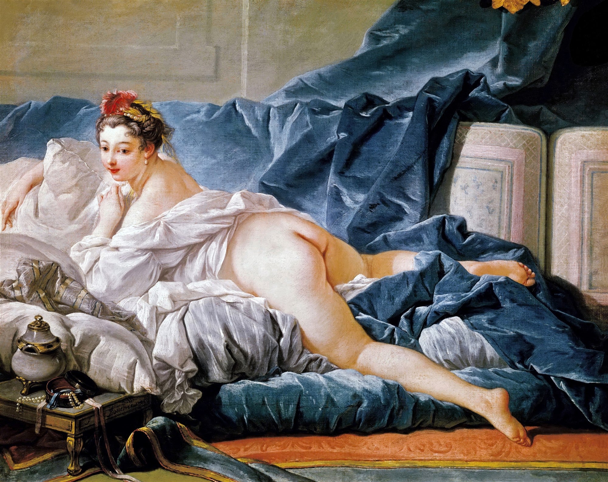 Quadro decorativo Odalisca Reclinada de François Boucher, retratando uma mulher nua reclinada em lençóis azuis e brancos, com olhar direto para o espectador.