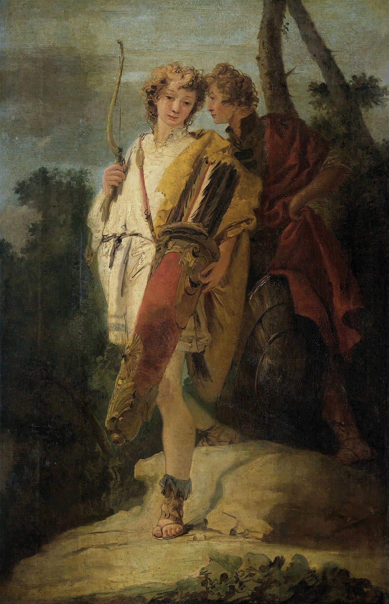 Pintura a óleo atribuída a Giovanni Battista Tiepolo, mostrando duas figuras masculinas jovens. Uma delas segura um arco, a outra está próxima, com uma aljava e armadura aos pés. Tons terrosos e escuros dominam o fundo, com a luz focada nas figuras. A cena sugere um momento de intimidade ou confidência.