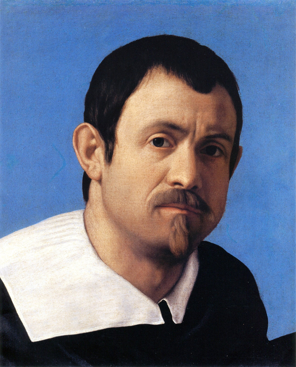 Retrato de um homem com bigode e cavanhaque, vestindo uma gola branca, contra um fundo azul vibrante. Obra atribuída a Giovanni Battista Sassoferrato.
