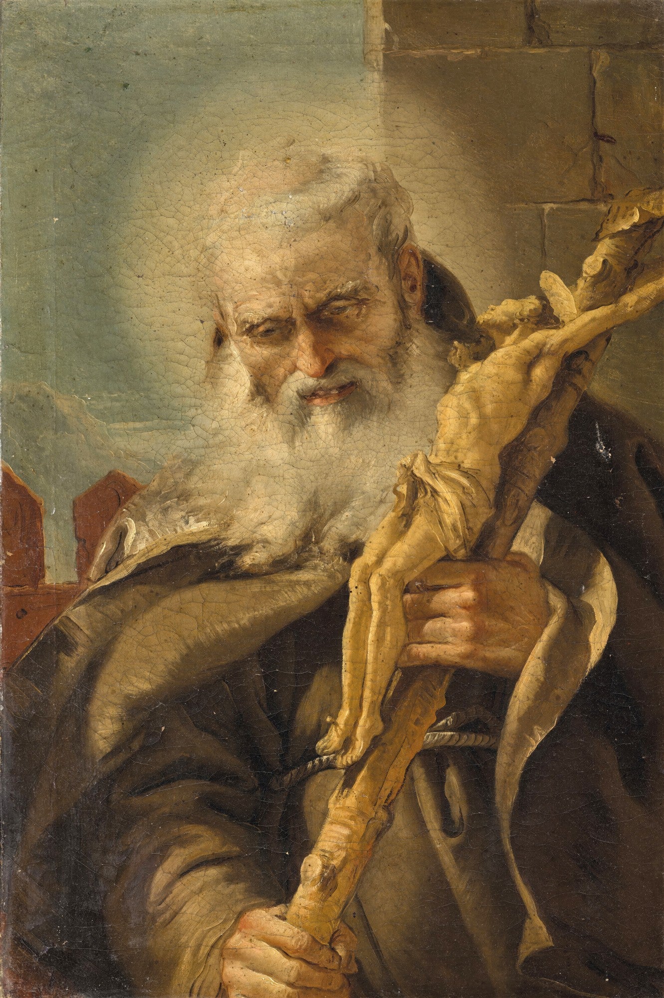 Retrato de um santo idoso de barba branca, segurando um crucifixo de madeira, em uma pintura a óleo de Giovanni Domenico Tiepolo. A luz destaca a expressão contemplativa e as texturas do manto e da barba.