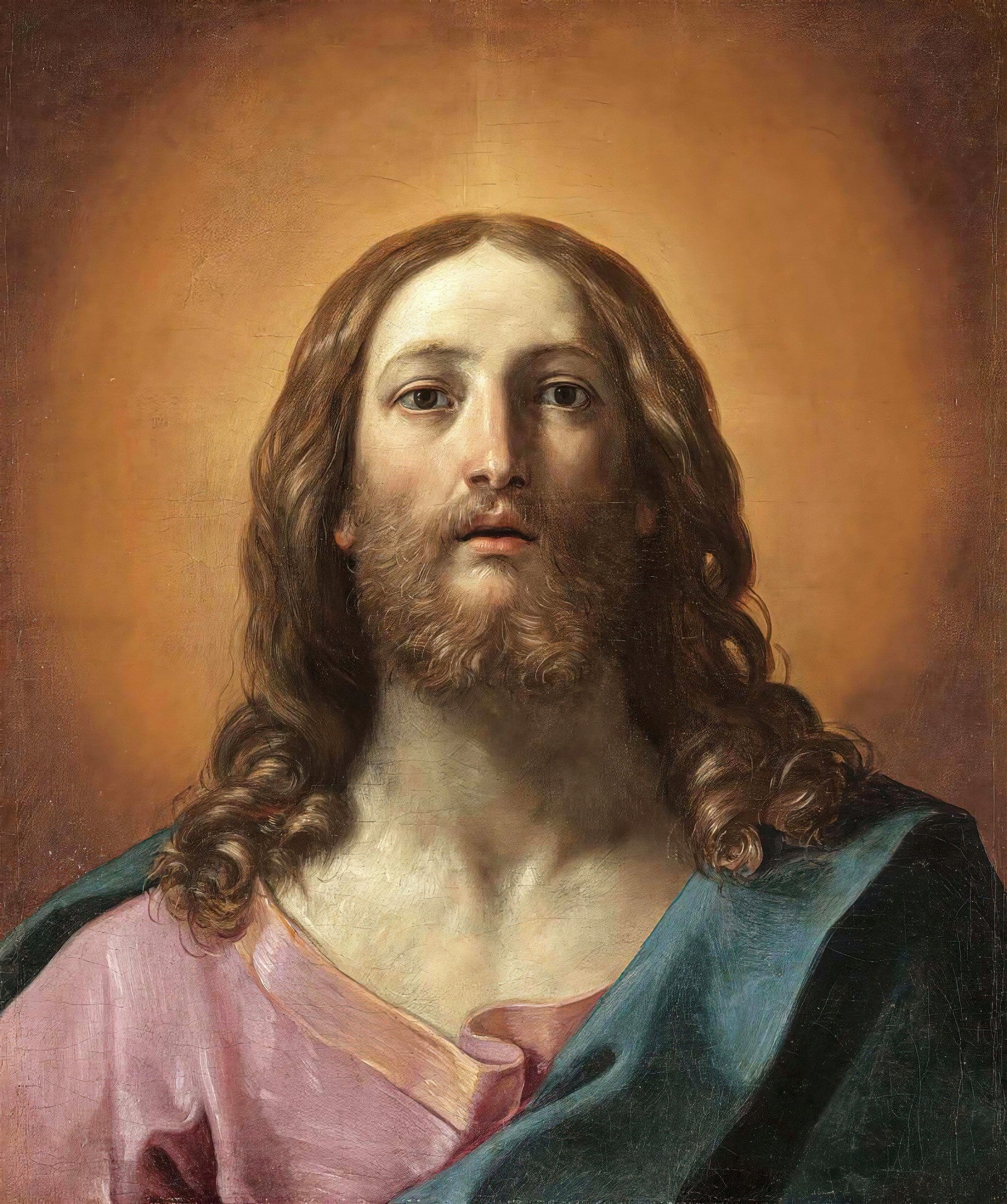 Retrato de Jesus Cristo atribuído a Guido Reni, com cabelos e barba longos, vestindo túnicas rosa e azul, sobre fundo dourado. O olhar é sereno e profundo.