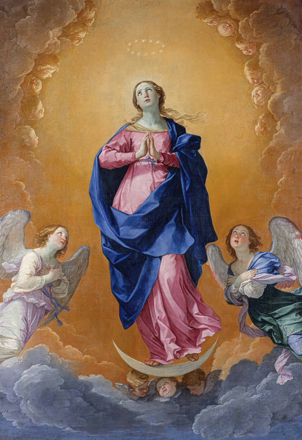 Quadro decorativo 'A Imaculada Conceição' de Guido Reni, mostrando a Virgem Maria em tons de rosa e azul, flutuando sobre uma meia-lua e nuvens, cercada por anjos e querubins, com uma auréola de estrelas acima de sua cabeça.
