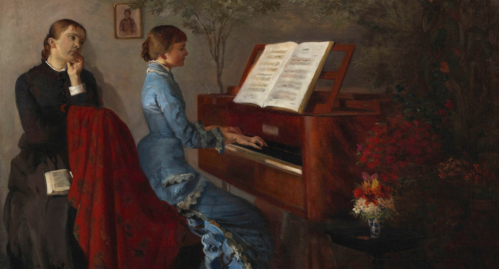 Quadro decorativo mostrando duas mulheres em um ambiente interior, uma tocando piano e outra pensativa, com cores sóbrias e um toque de vermelho vibrante em um xale. Cena de gênero atribuída a Jacek Malczewski.