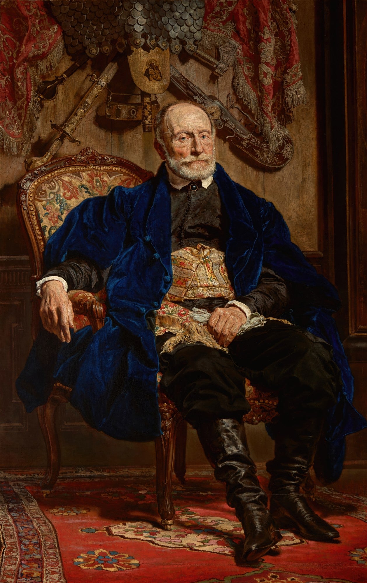 Retrato de um homem idoso com barba branca, vestindo um manto azul-royal e botas de couro, sentado em uma poltrona ornamentada, com armaduras e tecidos ricos ao fundo. Obra de Jan Matejko.