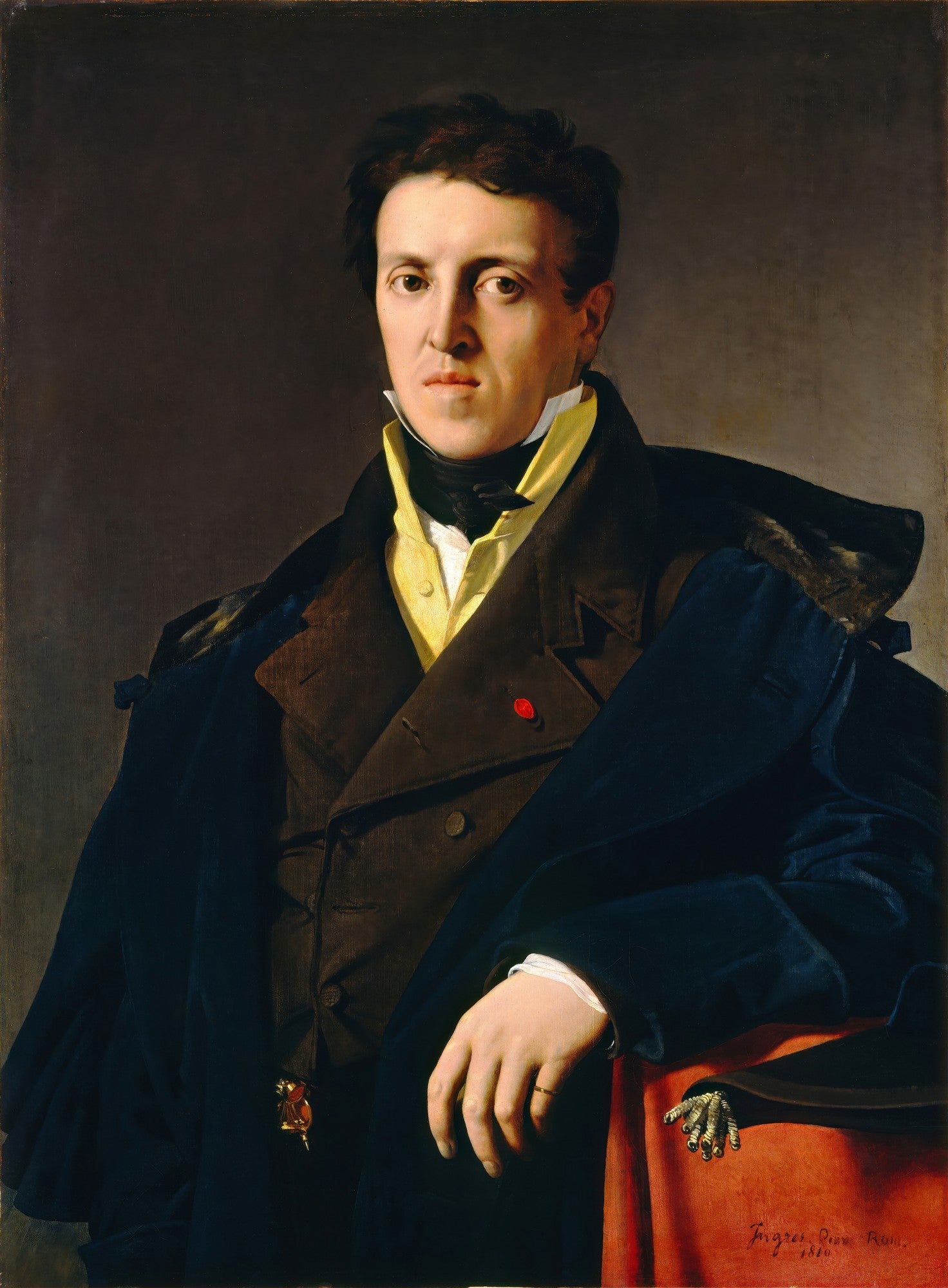 Retrato de Louis-François Bertin, um homem de meia-idade com cabelo escuro, olhar sério e direto, vestindo um casaco escuro e camisa clara, pintado por Jean-Auguste Dominique Ingres. A imagem mostra a obra de arte com detalhes da textura da pintura e as cores vibrantes.