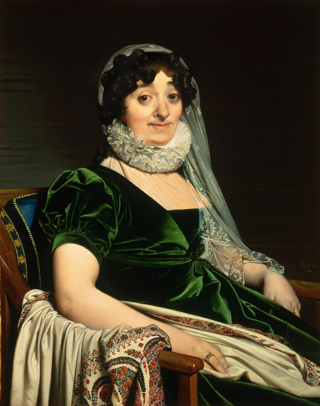 Retrato de Madame de Senonnes, obra de Jean-Auguste-Dominique Ingres, uma mulher sentada com um vestido de veludo verde e xale estampado, contra um fundo escuro.
