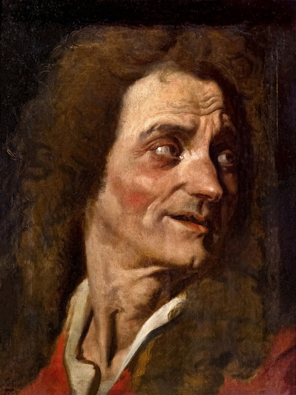 Retrato de um homem com cabelos castanhos e ondulados, expressão facial intensa e olhos arregalados, atribuído a Jean-Auguste Dominique Ingres. Fundo escuro realça o rosto iluminado.