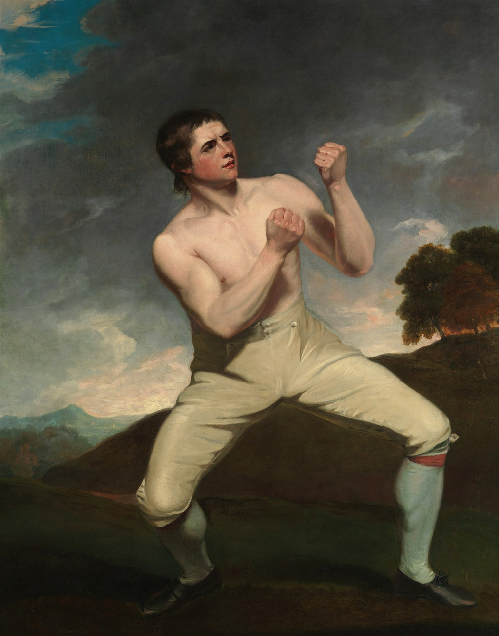 Retrato de John Jackson, o pugilista, em posição de luta, com um céu dramático e paisagem ao fundo, obra de John Hoppner.