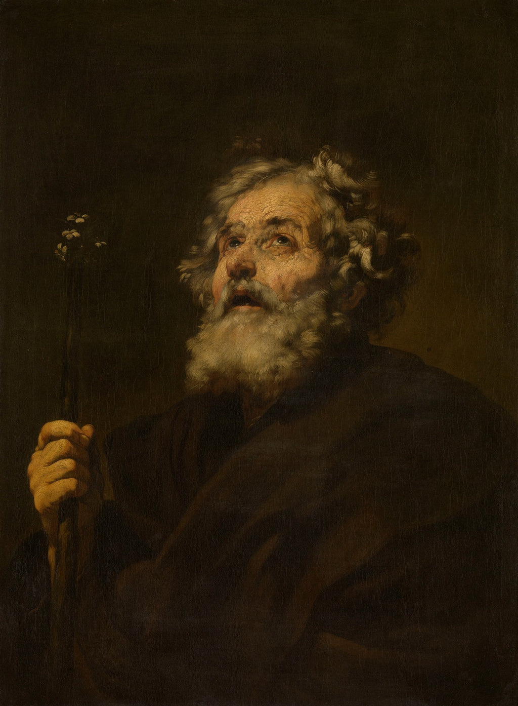 Retrato de um ancião barbudo com cabelos grisalhos, olhando para cima com expressão de êxtase ou súplica. Ele segura uma varinha florida na mão esquerda. A iluminação dramática destaca seu rosto e mão contra um fundo escuro, em estilo barroco.