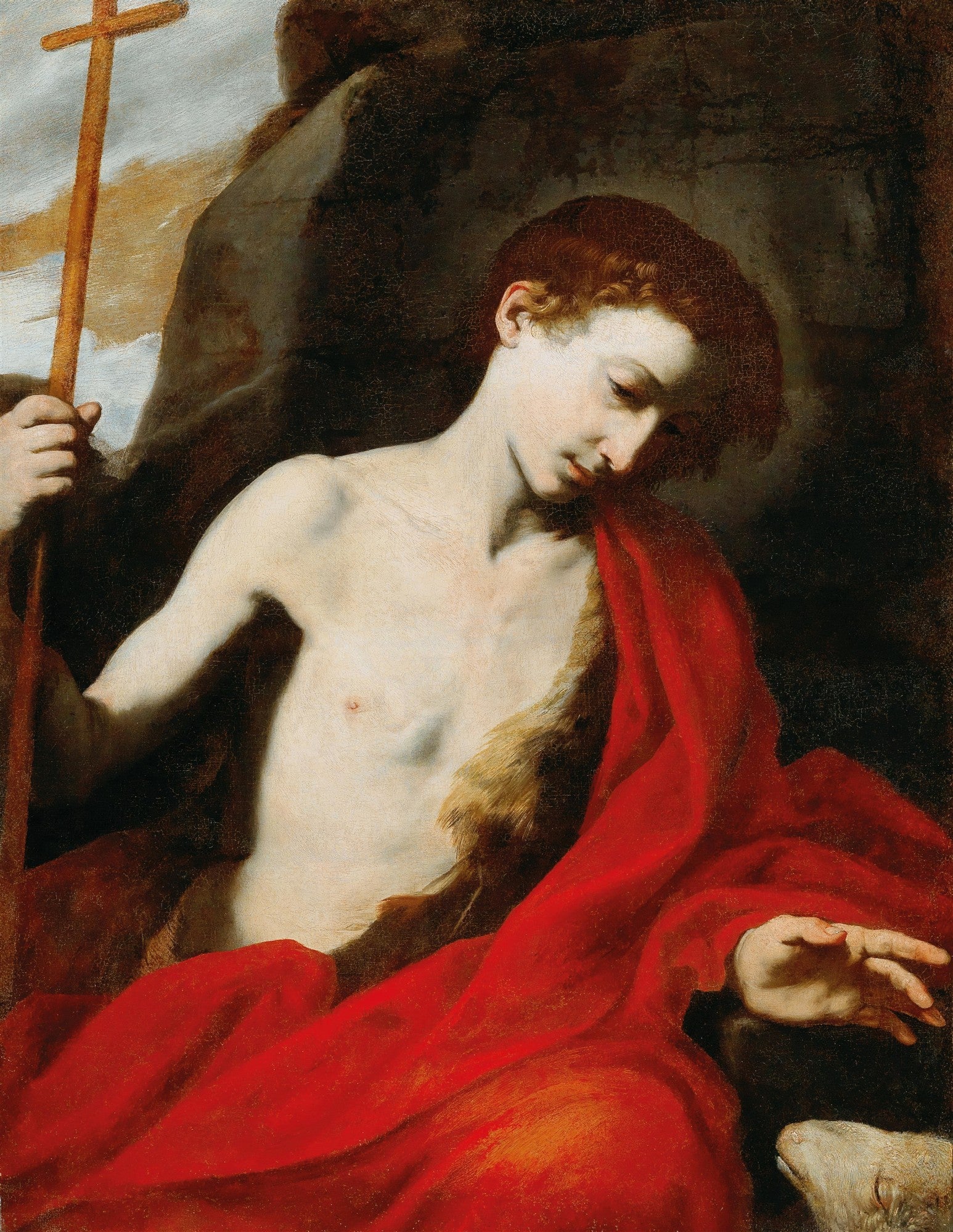 Quadro decorativo de São João Batista jovem, nu da cintura para cima, com manto vermelho vibrante, segurando uma cruz de madeira, em estilo tenebrista de Jusepe de Ribera.