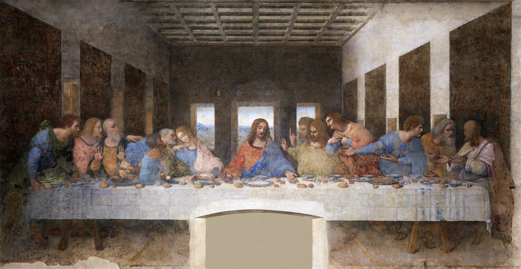Quadro decorativo da pintura A Última Ceia de Leonardo da Vinci, mostrando Jesus e seus doze apóstolos sentados à mesa durante a refeição. As expressões faciais são de surpresa e consternação, com uma perspectiva profunda da sala.