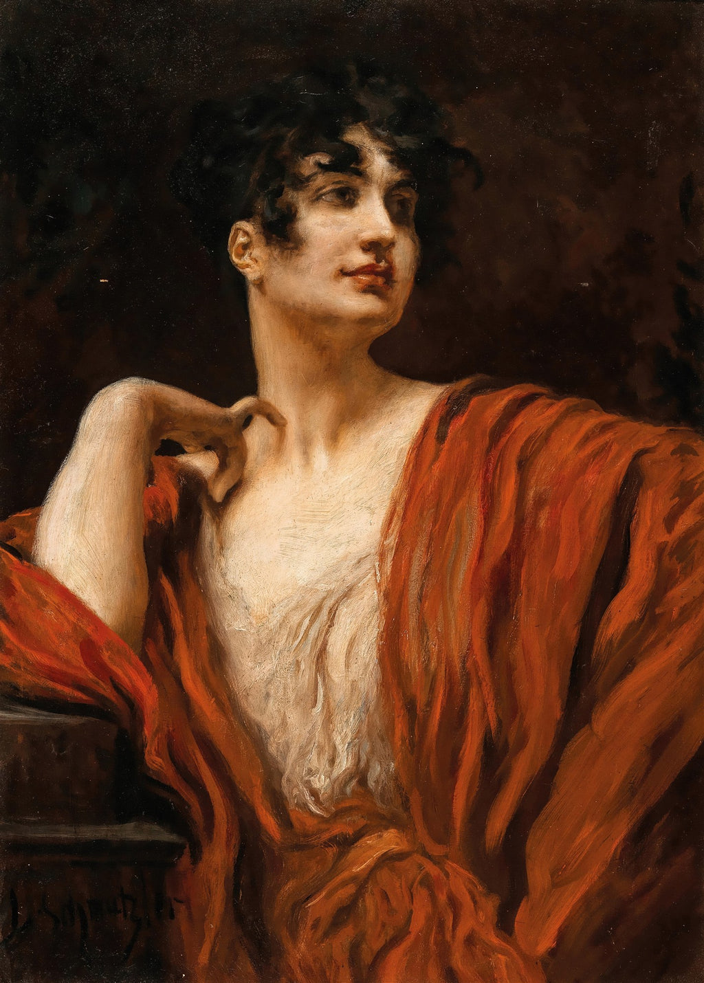 Retrato de uma mulher jovem de perfil, com cabelos escuros e cacheados, vestindo um manto vermelho vibrante que revela parte do seu colo. A iluminação é dramática, com fundo escuro.