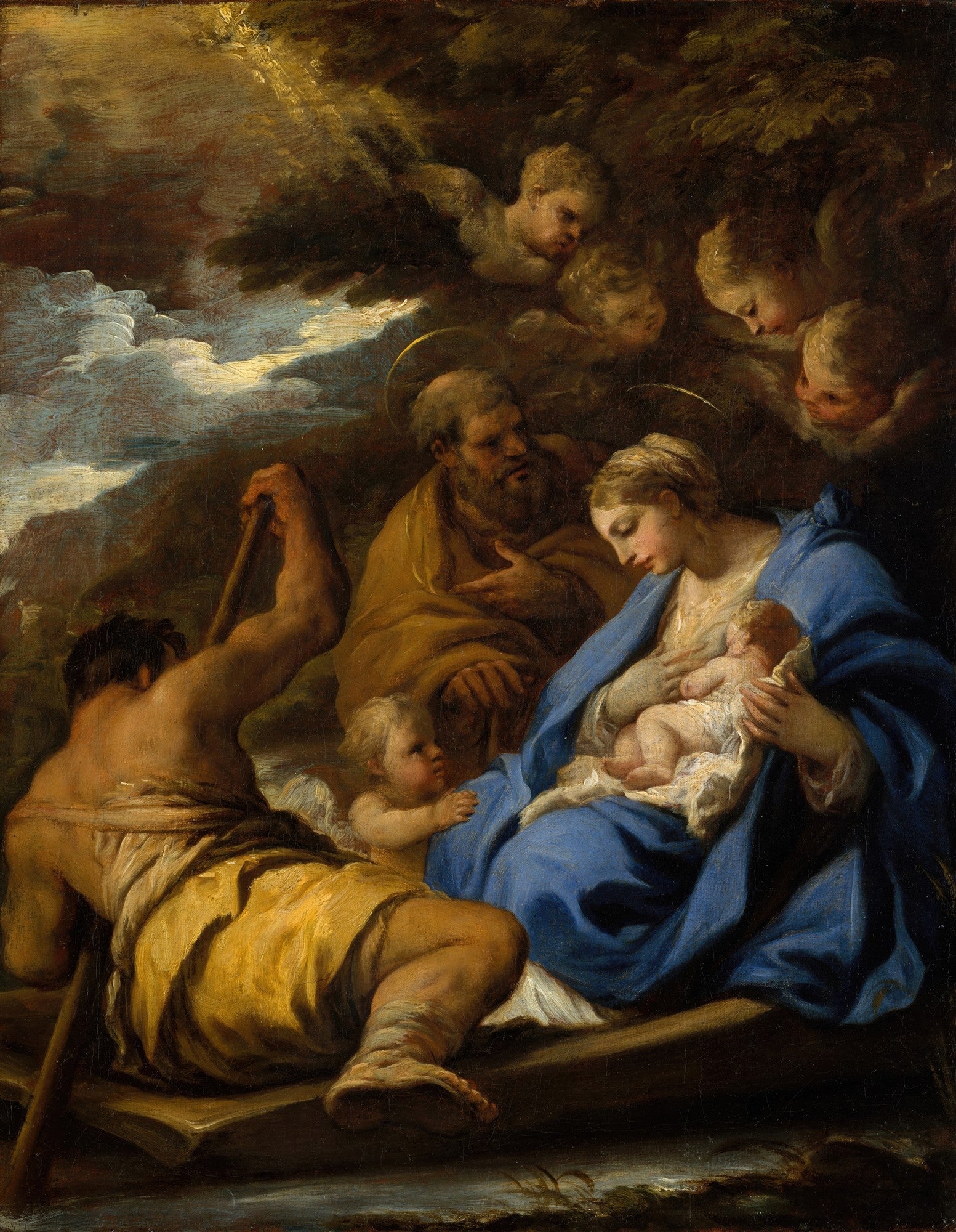Quadro decorativo 'A Fuga para o Egito' de Luca Giordano. Representa Maria amamentando o menino Jesus, José guiando um barco e anjos observando do céu.