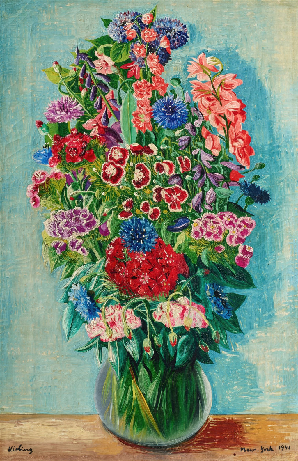 Quadro decorativo 'Vaso de Flores' de Moïse Kisling, com um exuberante arranjo floral em um vaso de vidro, sobre um fundo azul-claro texturizado. As flores, em tons vibrantes de vermelho, rosa, azul, roxo e branco, preenchem quase toda a tela, transmitindo vitalidade e alegria. A assinatura do artista e a data 'New York 1941' são visíveis no canto inferior direito.