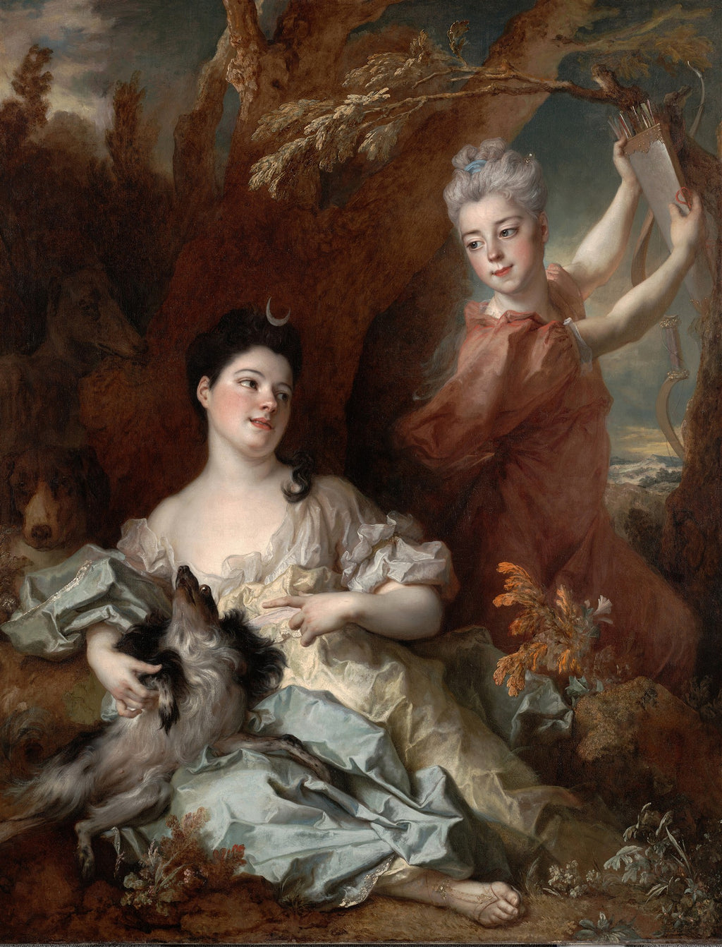 Quadro decorativo representando duas mulheres em uma cena mitológica, uma sentada vestida de azul claro e branco com um cão, a outra em pé de vermelho com arco e flechas, em um cenário de floresta escura. Atribuído a Nicolas de Largillière.