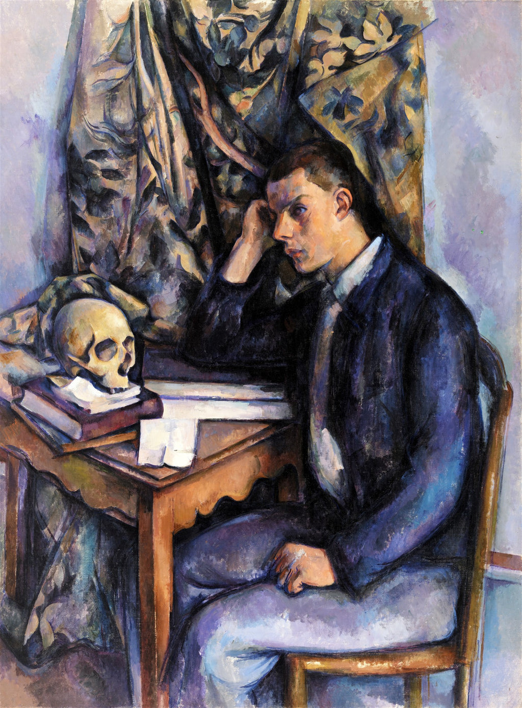 Quadro decorativo 'Jovem com Crânio' de Paul Cézanne, retratando um jovem pensativo sentado à mesa com um crânio ao lado, em tons de azul, marrom e roxo.