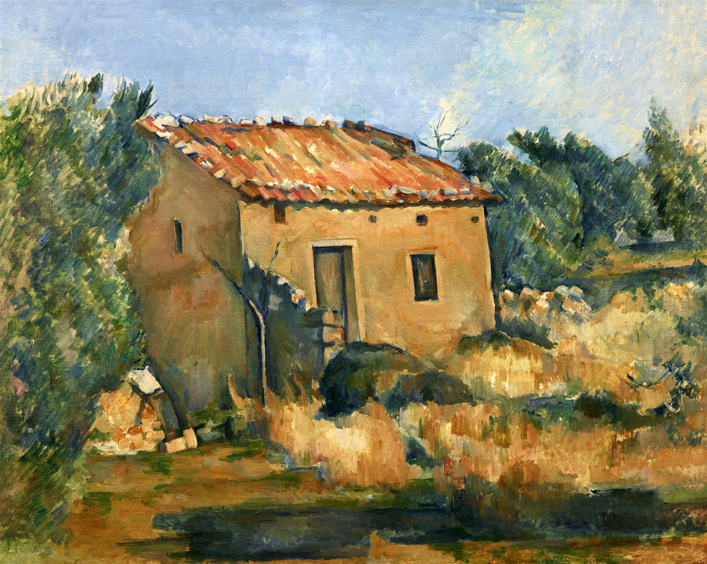 Quadro decorativo da pintura 'A Casa Amarela' de Paul Cézanne, mostrando uma casa rural ocre com telhado de telhas vermelhas, cercada por vegetação densa e um céu azul claro. As pinceladas são visíveis e a composição transmite profundidade e volume.
