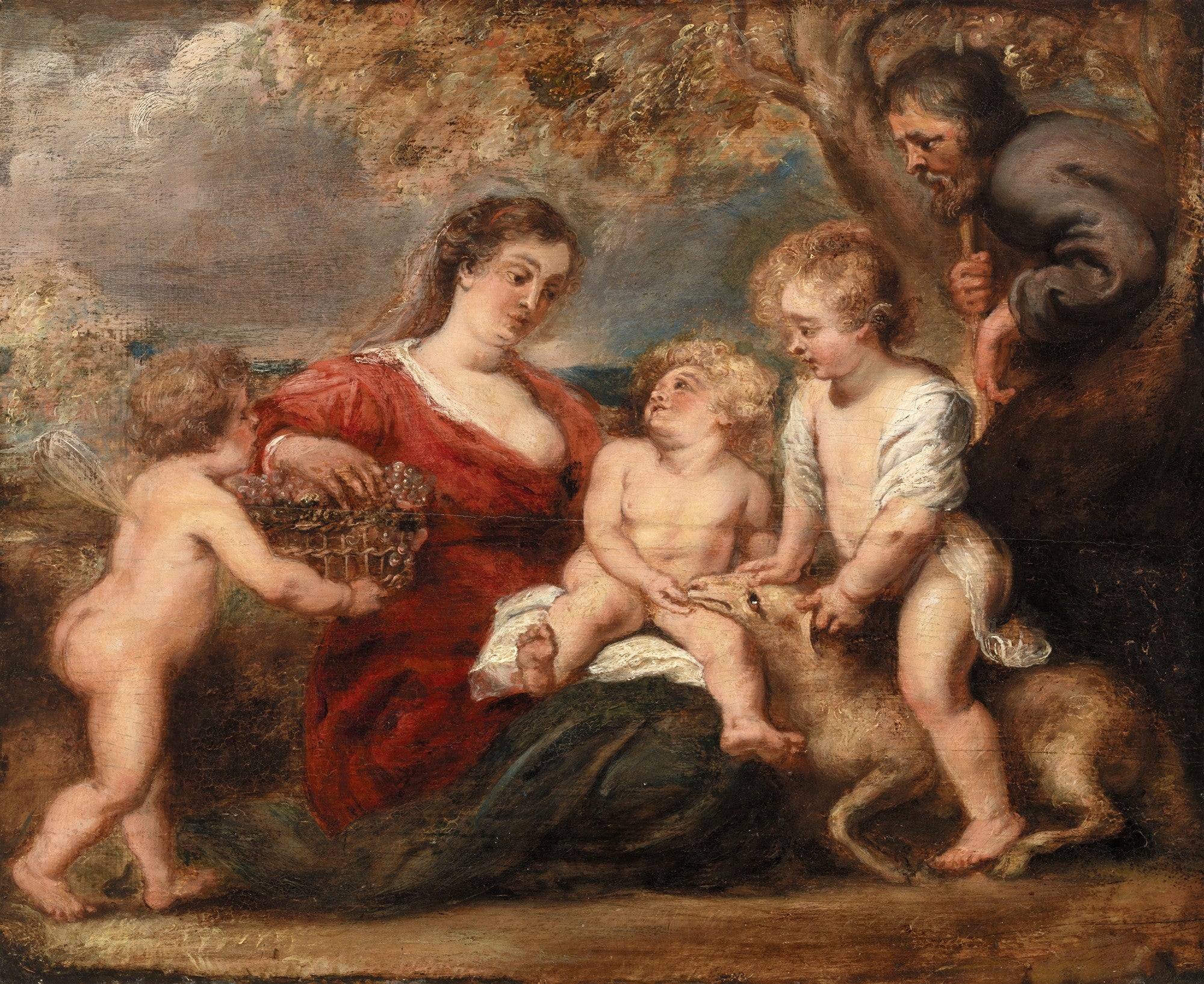 Quadro decorativo com pintura de Peter Paul Rubens, A Sagrada Família com São João e anjos, apresentando a Virgem Maria de vestido vermelho, Jesus e São João Batista crianças com um cordeiro, um anjo com cesto de uvas e São José ao fundo, em estilo barroco.