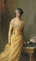 Retrato em óleo de uma mulher elegante de meia-idade, com cabelos grisalhos e um vestido amarelo dourado, assinado por Philip Alexius de László.