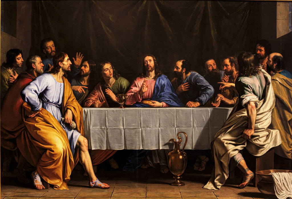 Quadro decorativo com a pintura 'A Última Ceia' de Philippe de Champaigne, mostrando Jesus e os apóstolos em uma mesa, com expressões de surpresa e questionamento. Cores sóbrias dominam a cena.