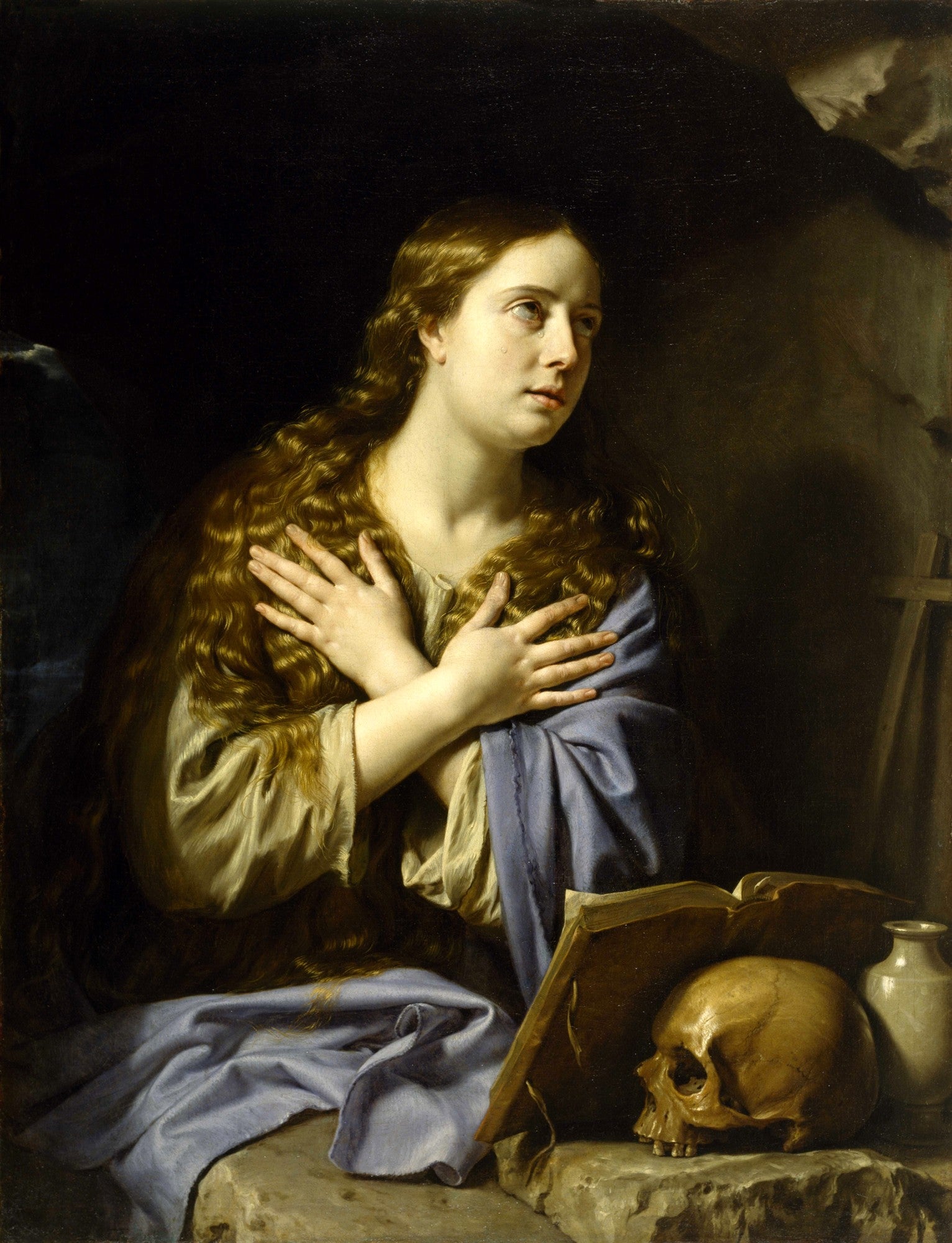 Quadro decorativo mostrando a Madalena Penitente de Philippe de Champaigne, com longos cabelos, olhar introspectivo, mãos cruzadas, um crânio e um livro.