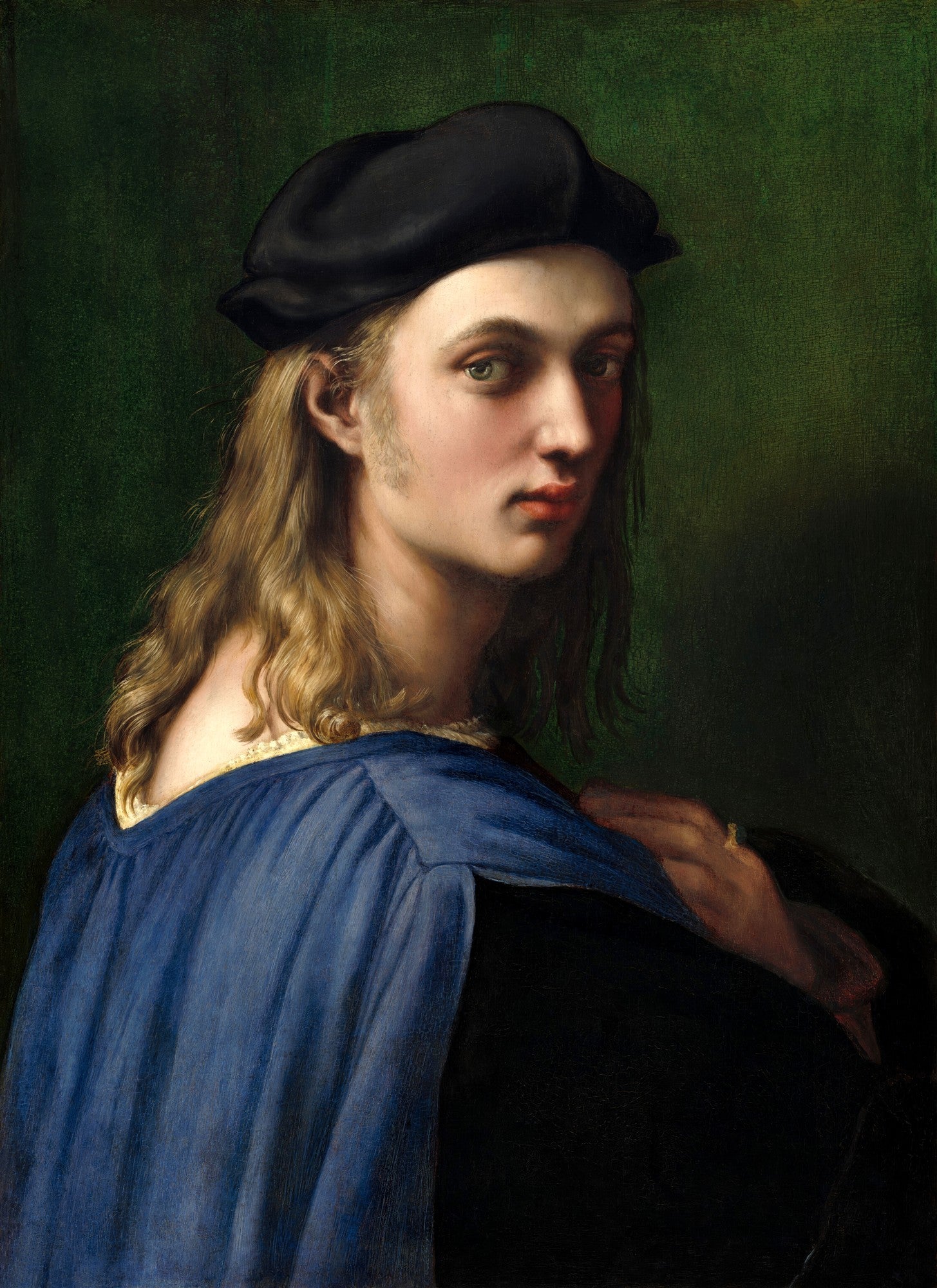 Retrato de um jovem com cabelos longos e chapéu preto, vestindo uma túnica azul sobre fundo verde escuro. A obra é atribuída a Rafael.