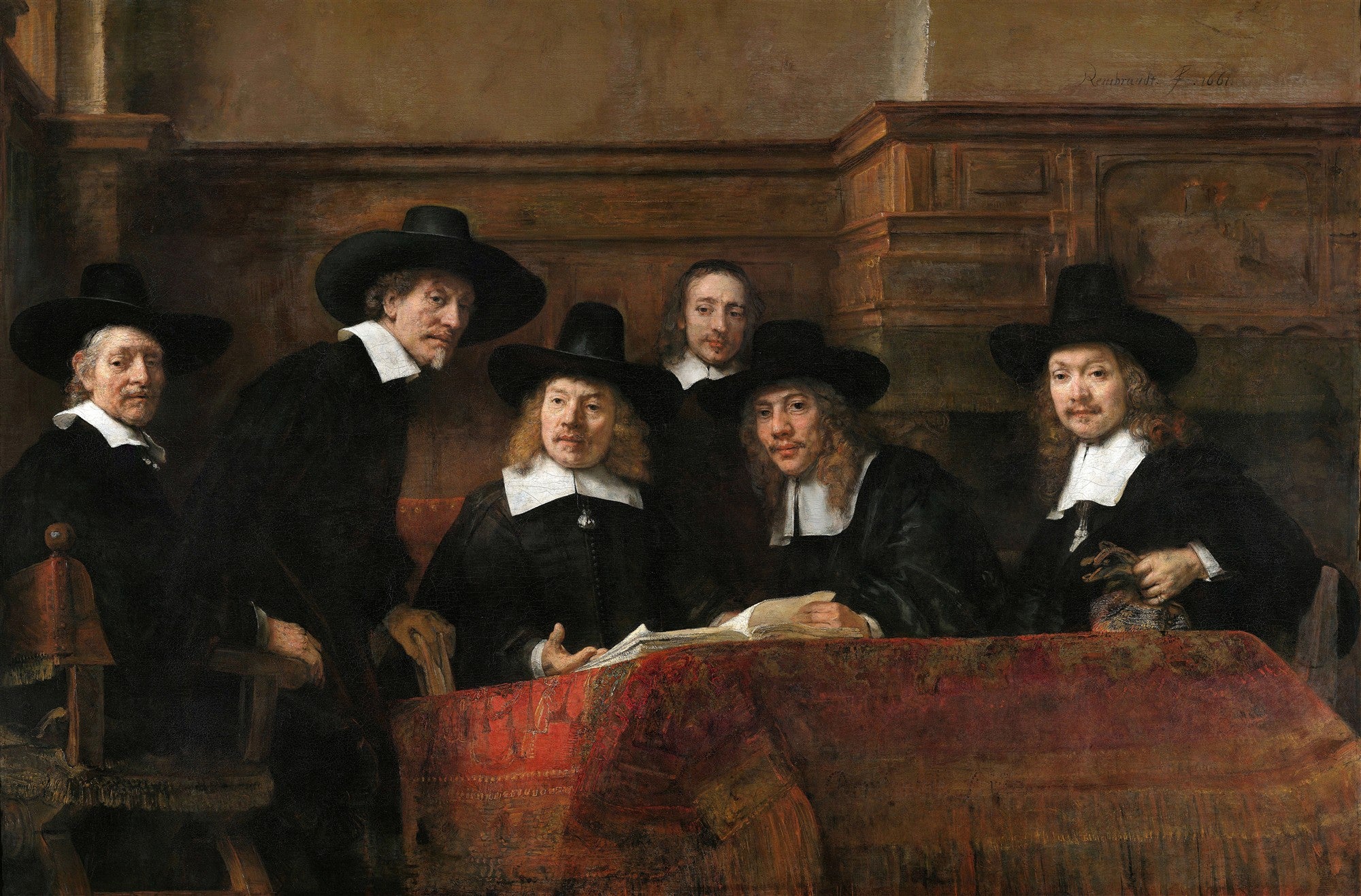 Quadro de Rembrandt van Rijn, "Os Síndicos dos Paneleiros", mostrando seis homens do século XVII vestidos de preto com chapéus e golas brancas, sentados ao redor de uma mesa vermelha, em uma sala com painéis de madeira.