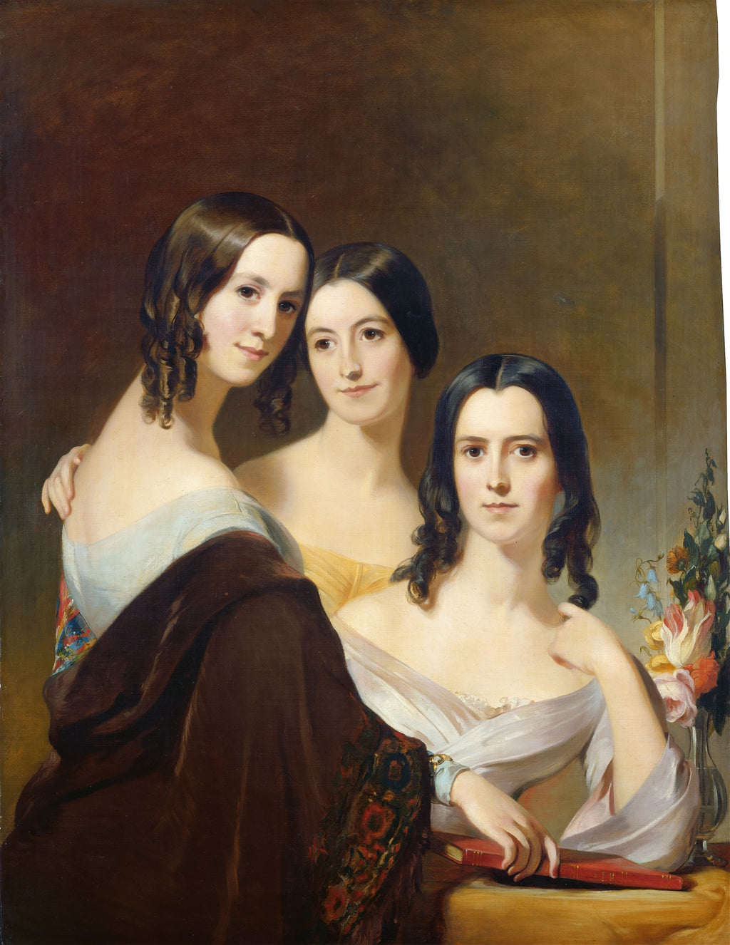 Retrato a óleo de três mulheres jovens com cabelos escuros, vestidas com roupas do século XIX de ombros nus, em tons pastéis e terrosos. A mulher da esquerda abraça a do meio, e a da direita segura um livro vermelho. A paleta é suave com um fundo escuro.