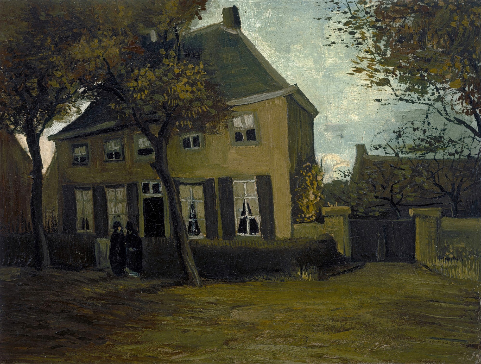 Quadro decorativo 'A Casa Amarela (A Rua)' de Vincent van Gogh, mostrando um edifício amarelo iluminado por dentro, com árvores de folhagem outonal em primeiro plano e figuras escuras na rua.